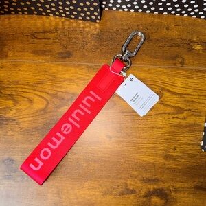 Lululemon Never Lost Key Chain in Lululemon Red & White